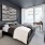 bedroom with a large window and modern decor