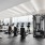 fitness center rendering showing plenty of equipment and modern decor in a large, spacious room