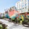 outside lounge area with colorful walls and hanging seats