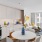 A kitchen beside a dining room