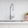 close-up of kitchen sink with modern decor